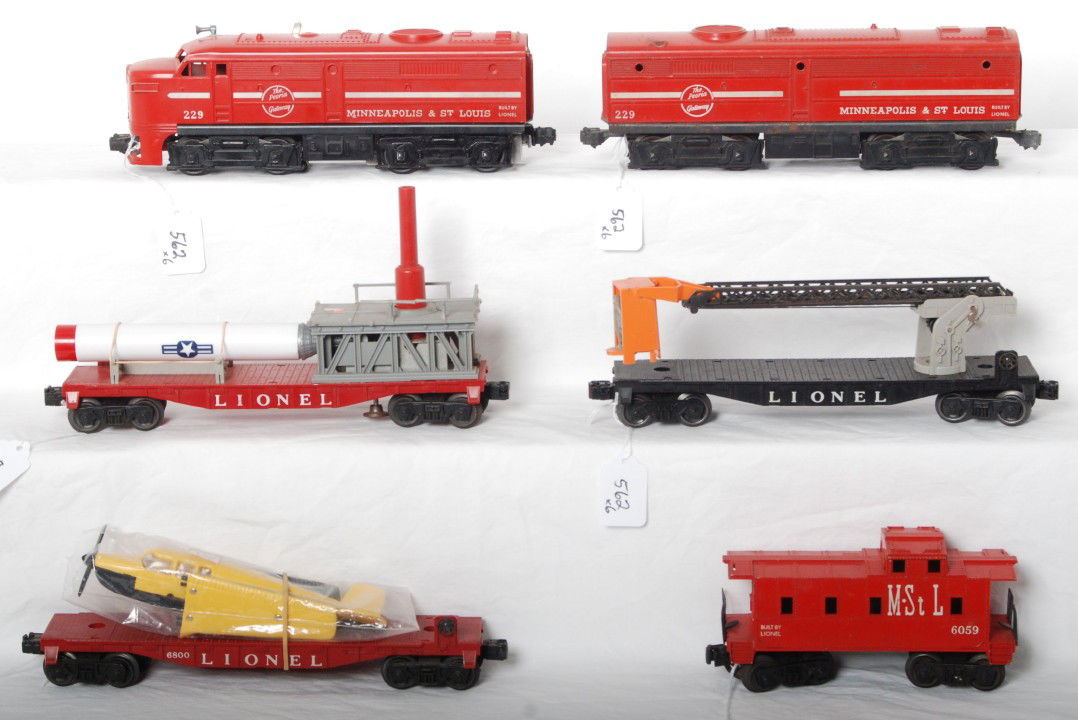 Lionel 229, 6800, cherry picker, missile launcher,: Postwar Lionel O gauge 229 Minneapolis and St. Louis diesel Alco A-B units with 6800 flatcar (reproduction airplane), missile launcher, cherry picker car with astronaut delivery basket, and 6059 Minne
