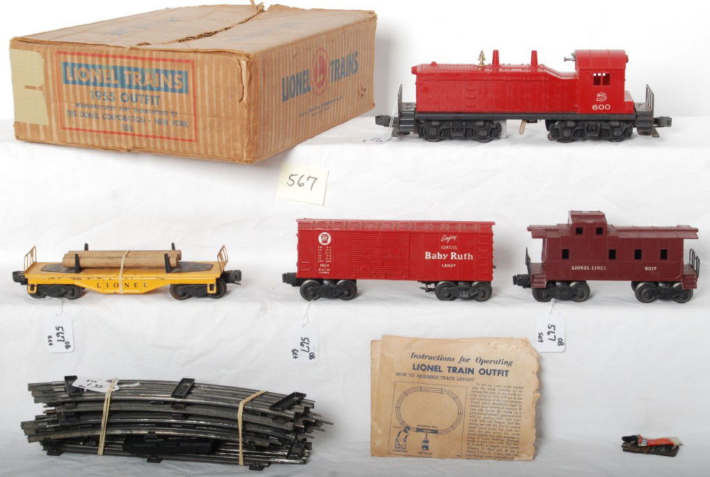 Postwar Lionel 1955 Outfit 500 in OB 600 MKT NW-2.: Postwar Lionel O gauge 1955 Outfit 500 in original box with 600 MKT NW-2 diesel switcher, lumber car, X6014 Pennsylvania Baby Ruth boxcar, 6017 caboose, 027 track and Camtrol uncoupler, instructions s