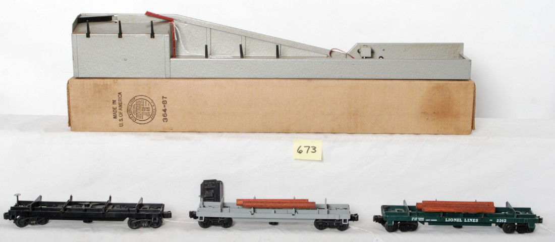 Lionel 3362, 364 in OB and two other lumber cars: Postwar Lionel O gauge 364 lumber loader in original box, C6 needs new ribbon, 364c w/chipped shell and five logs included. Box is C7-8 in shape with chipped label. Modern Era Postwar Celebration Seri