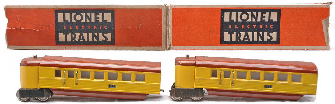Lionel 2-637 Reddish Brown/Yellow Coaches LN OBs: Lionel prewar O gauge two 637 reddish brown and yellow coaches with two vestibules both in OBs. The vestibules appear to have been restored to look like new. The paint is bright and clean, cars are C8