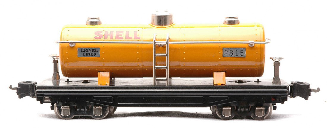Lionel 2815 Orange Shell Tank w/Nickel Trim: Lionel prewar O gauge 2815 orange Shell tank with nickel trim and journals. Both decals are fully intact. The paint is bright and clean and the tank has minimal run time, C8-9