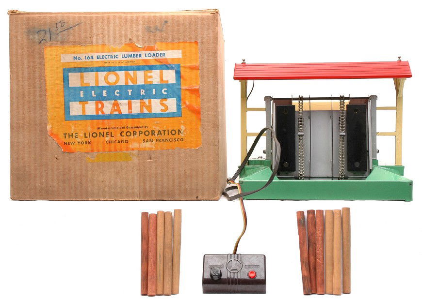Lionel Prewar 164 Electric Loader LIKE NEW OB: Lionel prewar 164 electric lumber loader with controller and wooden logs in OB. Except for a couple of minor nicks the lumber loader is C8. The OB is missing one interior flap and label is mostly inta