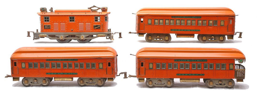 Am Flyer The Statesman Orange Pass Set 1473: American Flyer prewar wide gauge The Statesman lithographed orange passenger set no. 1473 including; 4654 0-4-0 electric loco with a gray frame, two 4151 Bunker Hill Pullmans and a 4152 Yorktown obser
