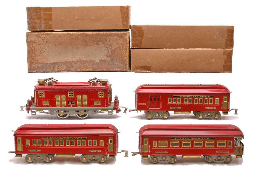 Am Flyer Red Hamiltonian Pass Set no. 1484: American Flyer prewar O gauge red Hamiltonian passenger set no. 1484 all in individual OBs containing; 4678 electric 0-4-0 loco with a gray frame, 4340 club car, 4341 Pullman and a 4342 observation. T