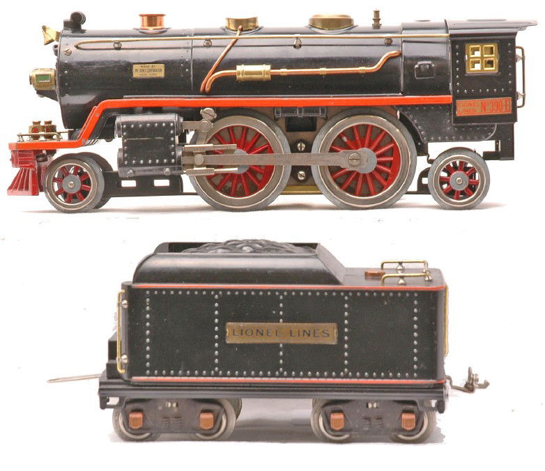 Lionel 390E Black Steam Loco 390T Tender LN: Lionel prewar standard gauge 390E black 2-4-2 steam loco and a 390T tender both with orange stripes. The loco and tender have brass and copper trim and the tender has copper journals. The loco has bee