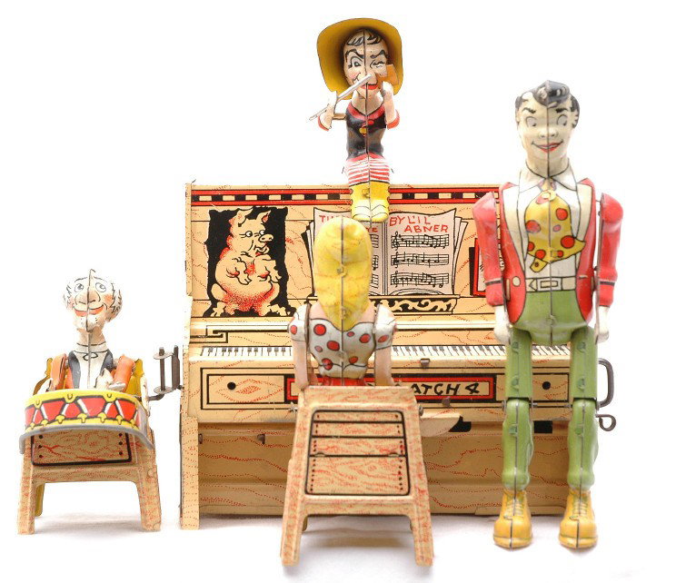 Unique Art Tin Litho Lil Abner & Dogpatch Band: Unique Art Mfg. Co. tin lithographed wind up Lil Abner and his Dogwood band, C7.