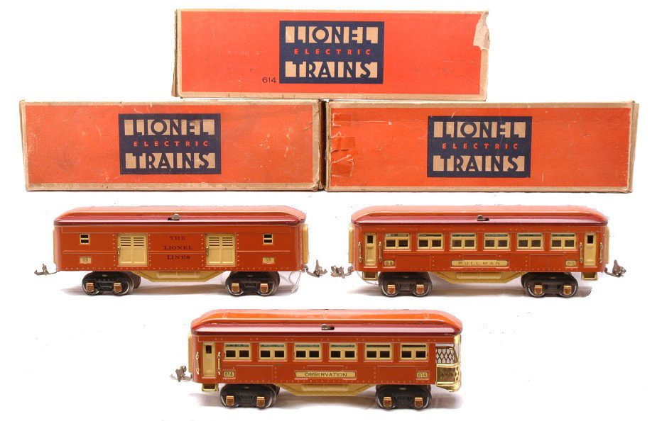 Lionel Terra Cotta/Maroon Pass Cars 615 613 614: Lionel prewar O gauge terra cotta and maroon passenger cars in OBs containing; 615 baggage, 613 Pullman and a 614 observation. The cars have cream inserts and copper journals. The cars are C7. The box