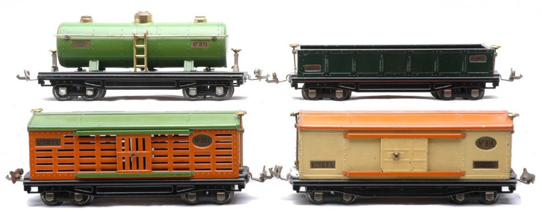 Lionel Prewar Freight Cars 812 813 814 815: Lionel prewar O gauge freight cars including; 812 dark green gondola, 813 orange cattle car with pea green roof, 814 cream boxcar with orange roof and 815 pea green tank all with brass trim and nickel