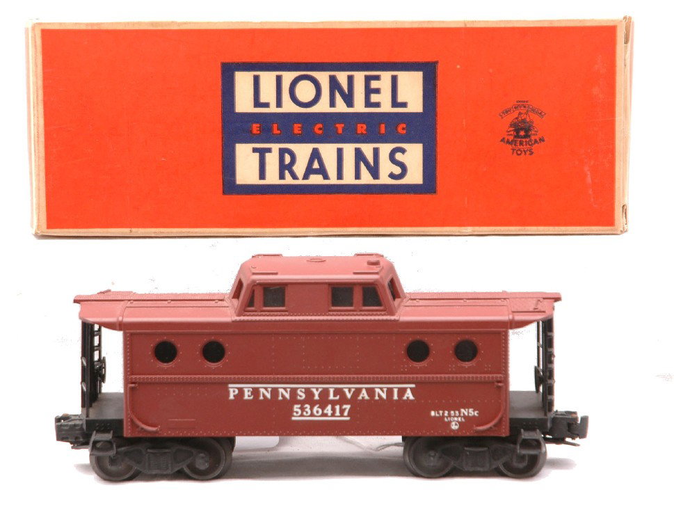 Lionel 6417-1 Tuscan PRR Caboose No NY Zone OB: Scarce Lionel postwar 6417-1 Tuscan Pennsylvania porthole caboose without New York Zone in OB, C8. The OB is clean and square and has all flaps attached.