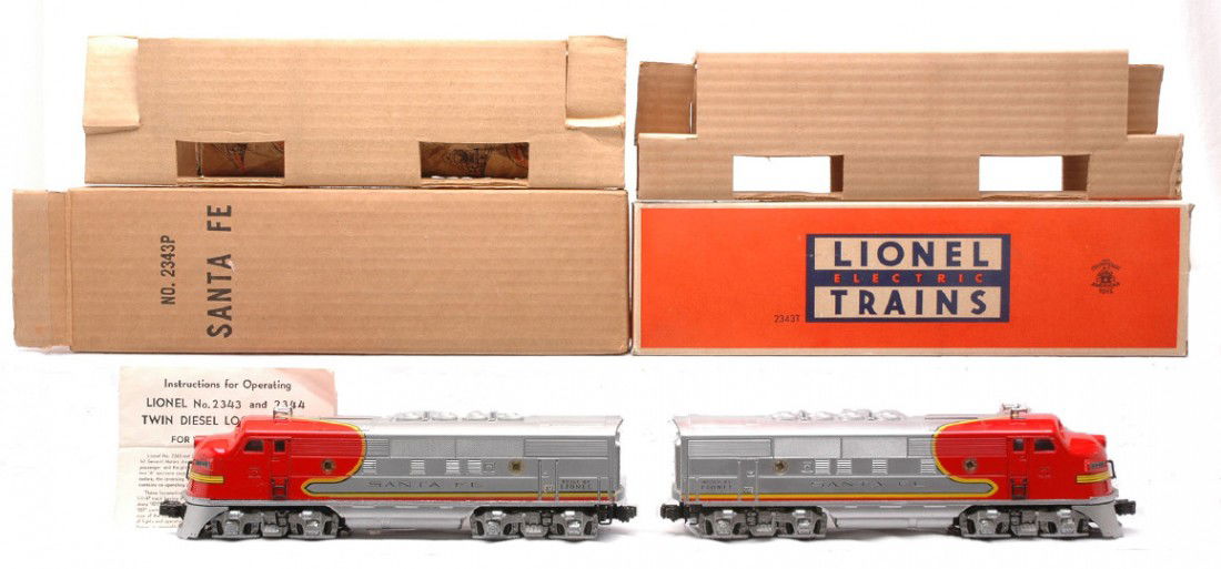 Lionel 2343P/2343T Santa Fe F3 AA Units OBs: Lionel postwar 2343P/2343T Santa Fe F3 AA diesel units with instruction sheet in OBs both with original cardboard inserts. The 2343P box also has the original paper wrap. Diesels appear to have never