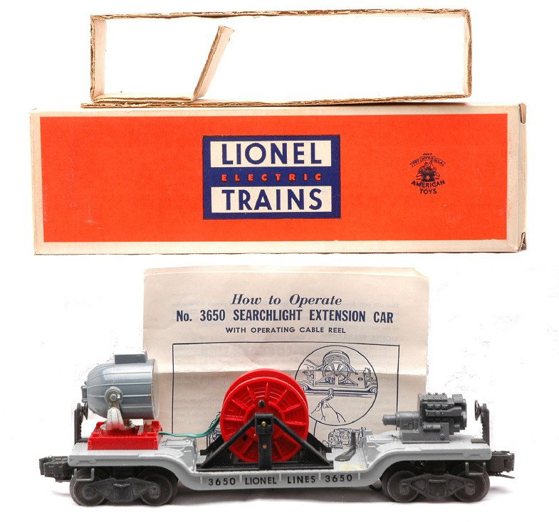 Lionel 3560 Searchlight Extension Car MINT OB: Lionel postwar 3560 searchlight extension car with two instruction sheets in OB that has an original cardboard insert. The car has never been run, C9-10. The OB has all flaps attached and is clean.