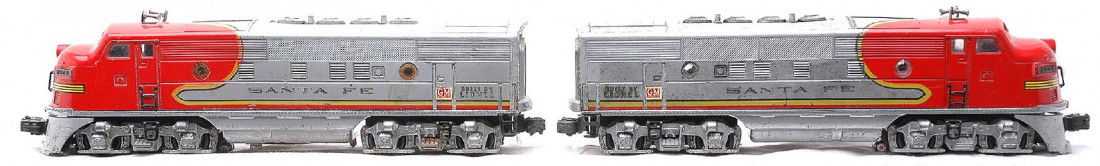 Lionel Postwar 2343 Santa Fe F3 AA Diesel Units: Lionel postwar 2343 Santa Fe F3 AA diesel units. The power A unit has battery damage with paint touch up. The cabs have mold. Units are C5.