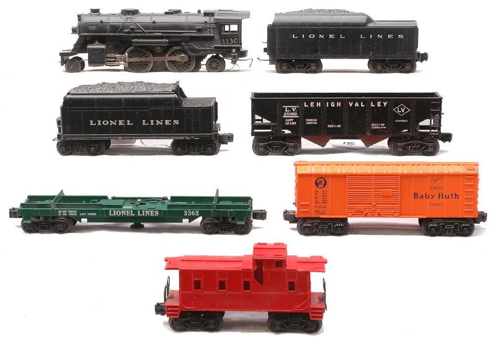 Lionel 1130 1130T 6076 3362 6067 6066T 1004: Lionel postwar 1130 black 2-4-2 steam loco, 1130T tender with a broken step and freight cars; black 6076 Lehigh Valley hopper missing a coupler, 3362 flatcar missing the dump mechanism and a 6067 unma
