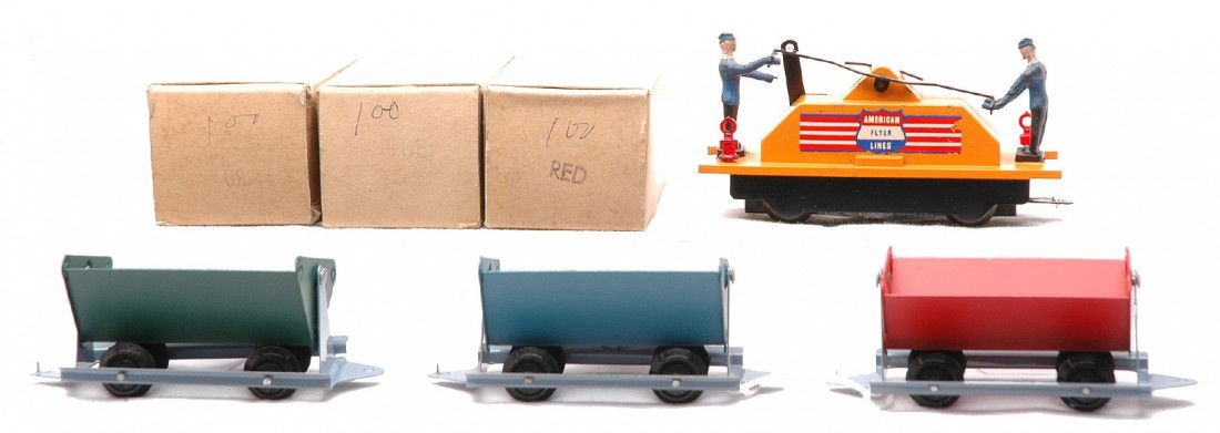 Am Flyer Miners Work Train Set no. 5300T: American Flyer S gauge Miners Work Train set no. 5300T, circa 1953-54 consisting of a 740A hand car with a draw bar and the three four-wheel tipples, one red, one blue and one green. The tipple cars a
