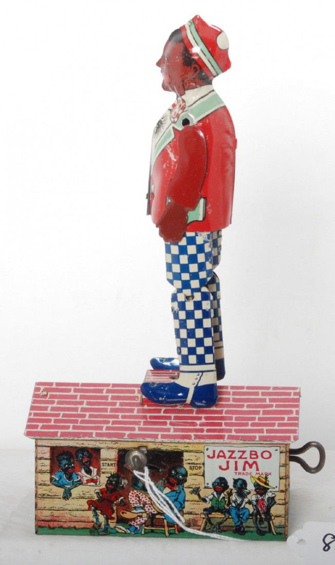 Unique Art Jazzbo Jim, The Dancer on the Roof toy: Unique Art patented 1921, Jazzbo Jim, The Dancer on the Roof, lithographed tinplate mechanical windup toy, C7. Missing key.