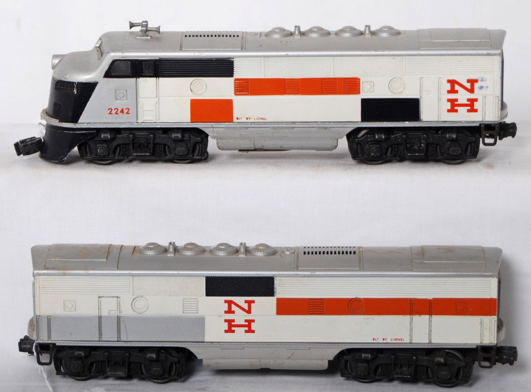 Lionel 2242 New Haven F3 A-B diesel locomotives: Postwar Lionel O gauge 2242 New Haven F3 A-B diesel locomotives with very strong colors and graphics. A unit has a rub besides the N on the engineers side of loco. Trains will clean and polish to look