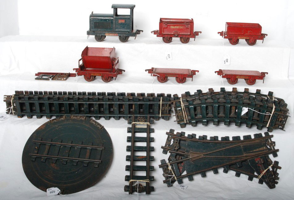 Buddy L Outdoor Railroad roundhouse, track, trains: Buddy L Outdoor Railroad, three stall roundhouse, round table, curved and straight track, left and right hand turnouts, three track connectors, BL-16 loco, two flatcars, one gondola, one dump car, and
