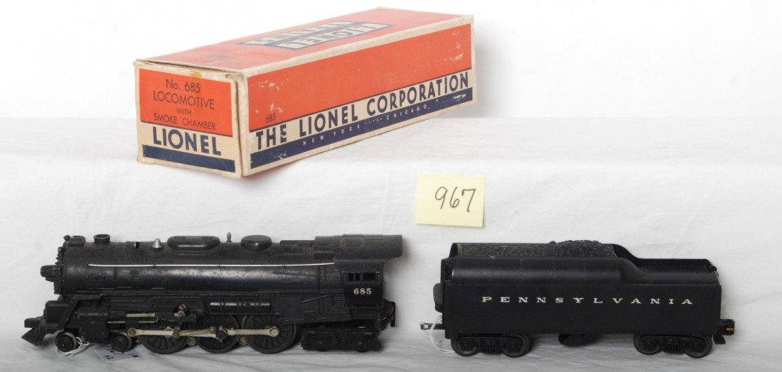 Lionel 685 smoke chamber with PRR whistle tender: Postwar Lionel O gauge 685 steam locomotive with smoke chamber in original box with insert with unnumbered Pennsylvania whistle tender. Tender shell may be reproduction. Loco should clean nice C6+ wit