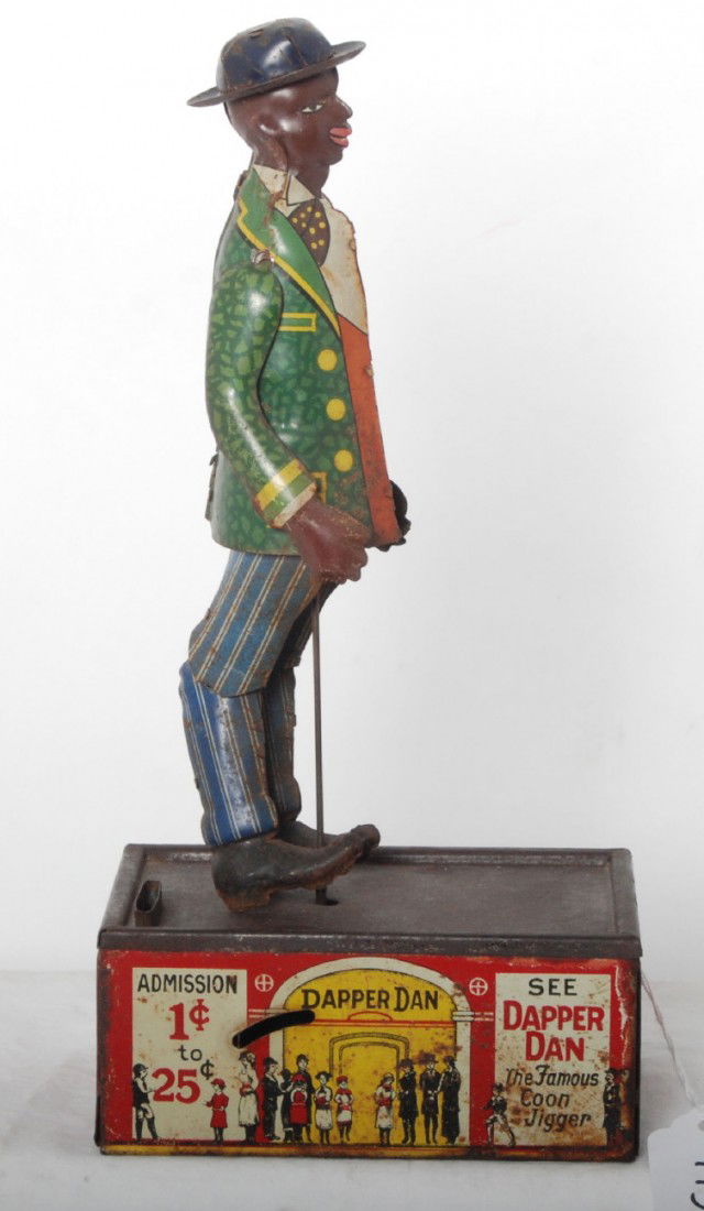 Marx, Dapper Dan, Coon Jigger Bank, The Jigging Ba: Louis Marx & Co., Dapper Dan, Coon Jigger Bank, The Jigging Banker lithographed tinplate mechanical windup toy, C5-6.