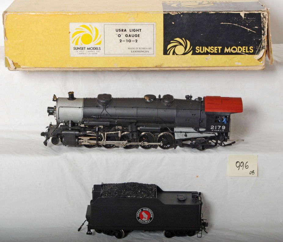 Sunset USRA Great Northern 2-10-2: Sunset modern O scale two rail brass Great Northern 2-10-2 steam locomotive in OB. Loco is professionally painted, but not factory painted. Loco is C7 with some paint chips and marker light are loose.