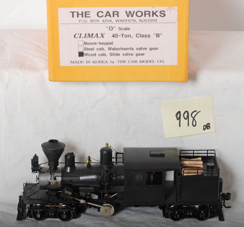 Car Work brass Climax 40 ton steam locomotive: The Car Works O scale two rail brass Climax 40-to class B steam locomotive in OB. Loco is wood cab with side valve gear. Loco is C8-9.