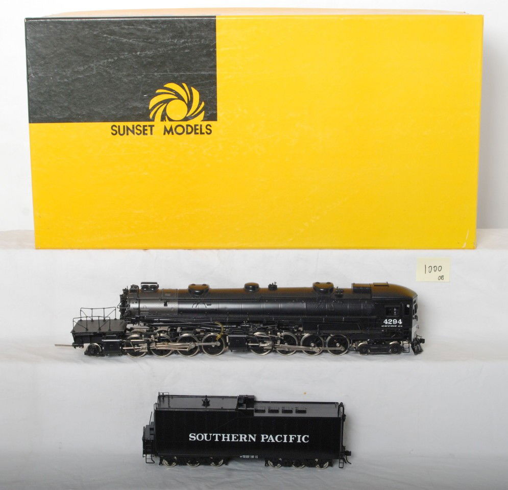 Southern Pacific Sunset AC-12 cab forward: Sunset modern O scale two rail brass AC-12 cab forward steam locomotive in OB. Loco has a Lenz LE-200 DCC decoder installed. Loco is C8 condition with run time. Locomotive original box has light corne