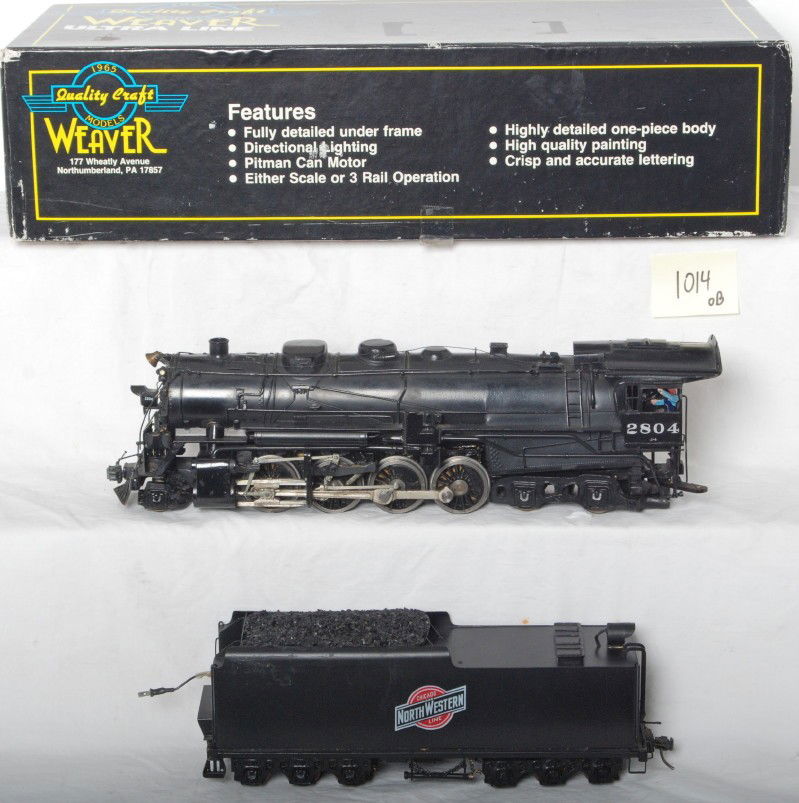 Labough O scale C&NW 2-8-4 steam locomotive: O scale two rail Labough Chicago and Northwestern 2-8-4 steam locomotive. Loco is C7+ condition some paint chips at edges and some partially loose detail items. Box included is not original.