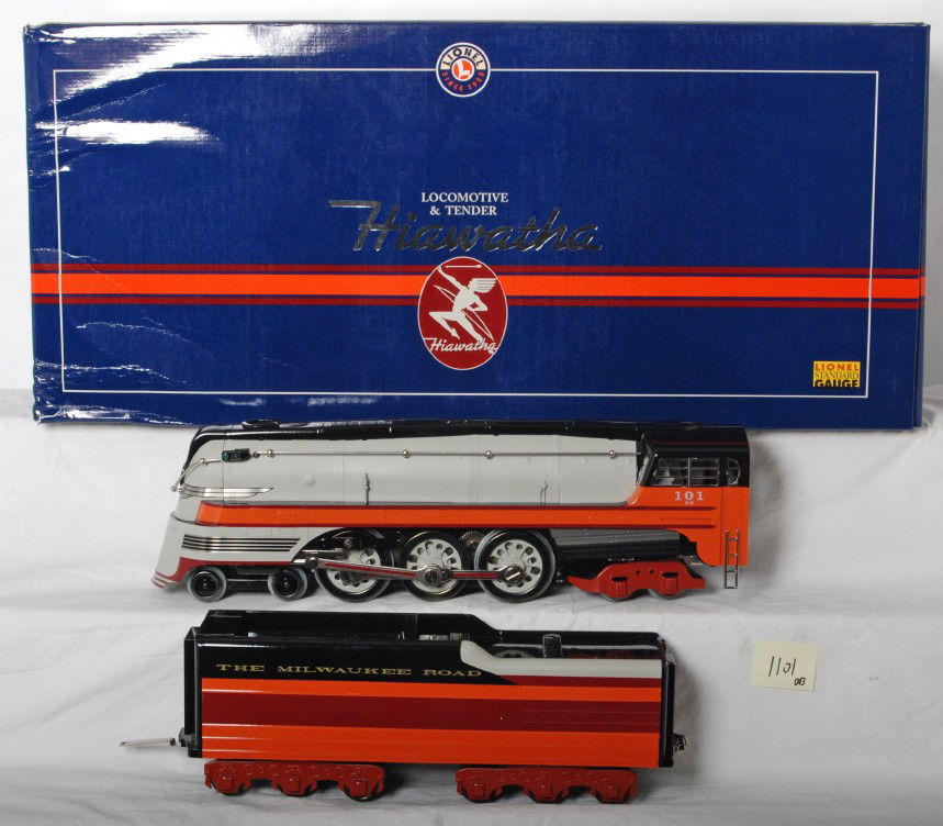 Lionel 13004 Milwaukee Std. gauge Hiawatha Loco: Lionel modern standard gauge tinplate Milwaukee Road Hiawatha 13004 steam locomotive in OB. Loco is C8-9 with very light run time. Inner carton shows some damage in one corner but no damage to loco.