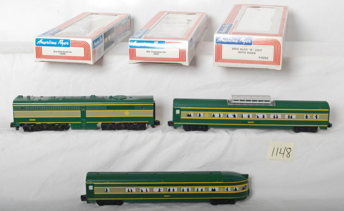 Lionel American Flyer Erie 8252 B unit, 9506, 950: Modern era Lionel - American Flyer S gauge 8252 Erie Alco B unit with horn, 9506 Erie vista dome car, and 9507 Erie observation. All trains are unrun. Loco has rust on slide shoes and tiny specks of r