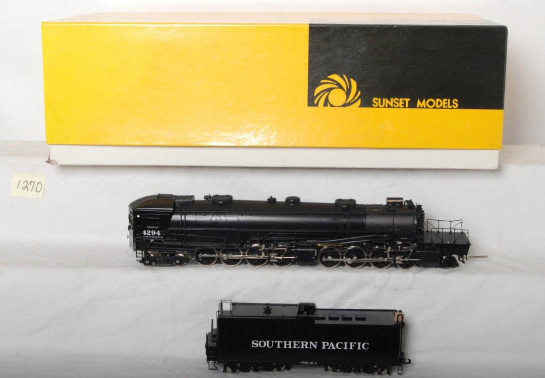 Sunset Models Southern Pacific AC-12 cab forward: Sunset Models, made in Korea, brass O scale 2 rail, Southern Pacific AC-12 cab forward steam locomotive, factory painted in original box with good foam. Train looks C9 area. Box shows little to very l