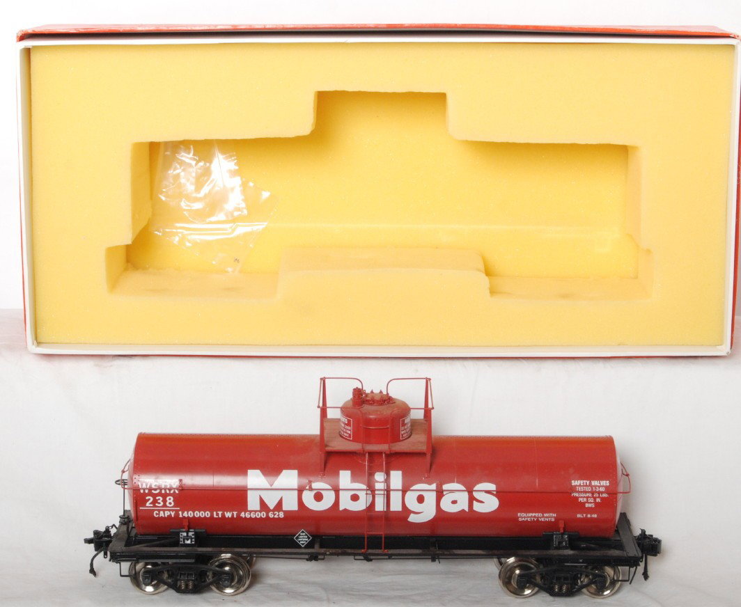 Precision Scale Mobilgas tank car: Precision Scale Co. modern one gauge / G scale 98513 Mobilgas 10,000 gallon tank car in OB. Car is C8 with run time and dirt on top of the tank car. OB shows some light wear and spots