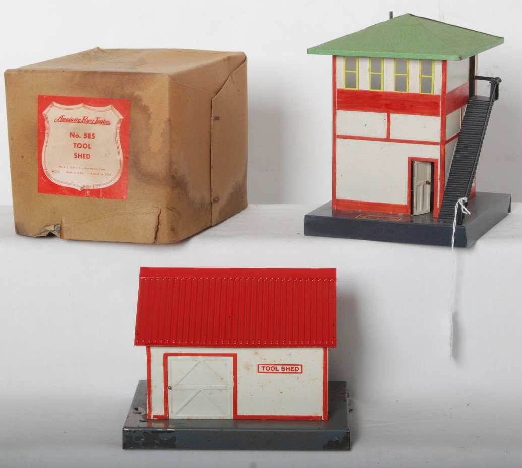 American Flyer 585 Tool Shed in OB and switch tow: Postwar American Flyer S gauge 585 tool shed in original box and switch tower. Switch tower has repainting and tool shed has flaking paint, C5-6. Excellent restoration candidates. 585 OB is C7 with ni