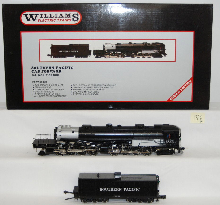Williams Southern Pacific 7002 Cab Forward: Williams modern O gauge 7002 Southern Pacific brass cab forward steam locomotive in OB. Loco has been upgraded with Pittman motor and QSI sound. Loco is C8 condition with run time. Deck on the rear of