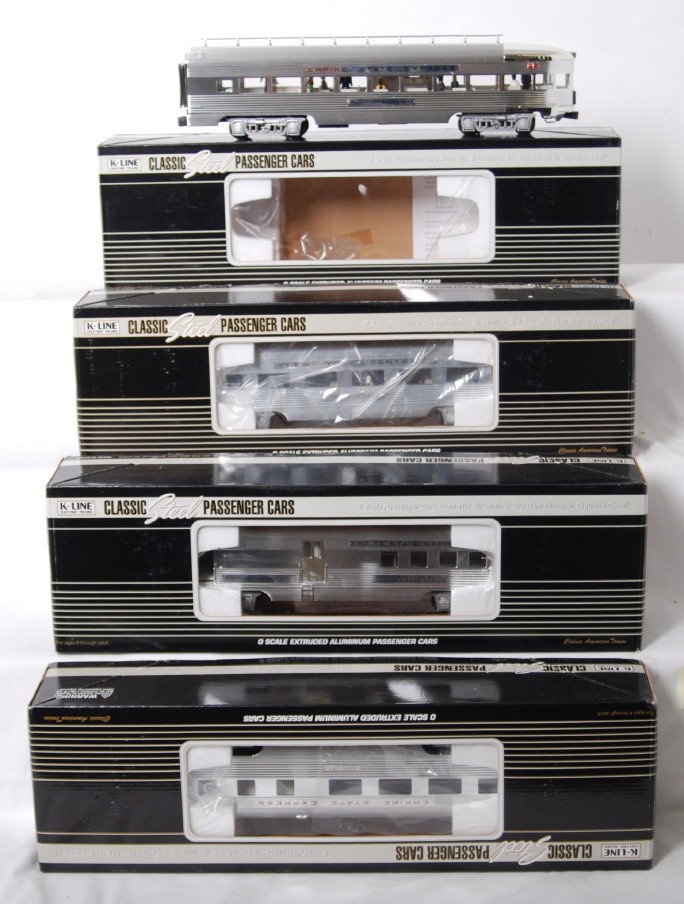 K Line Aluminum Empire State pass four pack K4670: K Line modern O gauge New York Central Empire State Express passenger four pack in OB. Catalog number is K4670A. Includes Thomas Dewey coach, Alonzo Cornell RPO, Theodore Roosevelt observation, and Jo