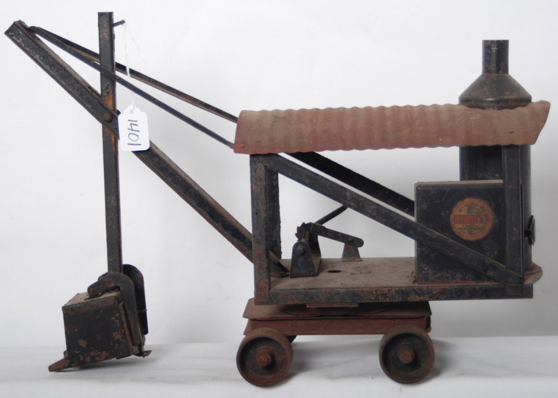 Buddy L No. 220 steam shovel complex undercarriag: Earlier Buddy L No. 220 steam shovel with coal bunker, water feed, hinged boiler door, air slots, complex undercarriage, C5-6 with surface rust and some original? paint.