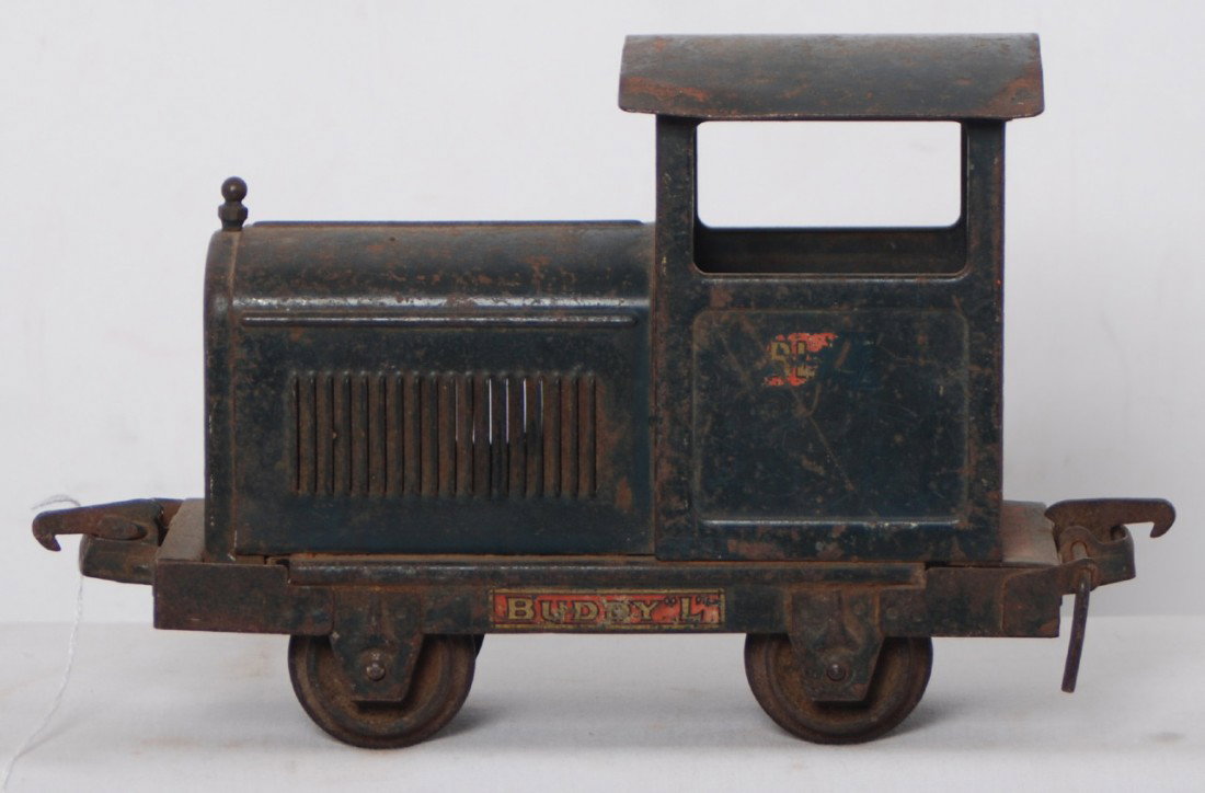 Buddy L industrial diesel switcher locomotive Out: Buddy L Outdoor Railroad diesel industrial switcher locomotive, surface rust, otherwise C6. Original paint and decals.