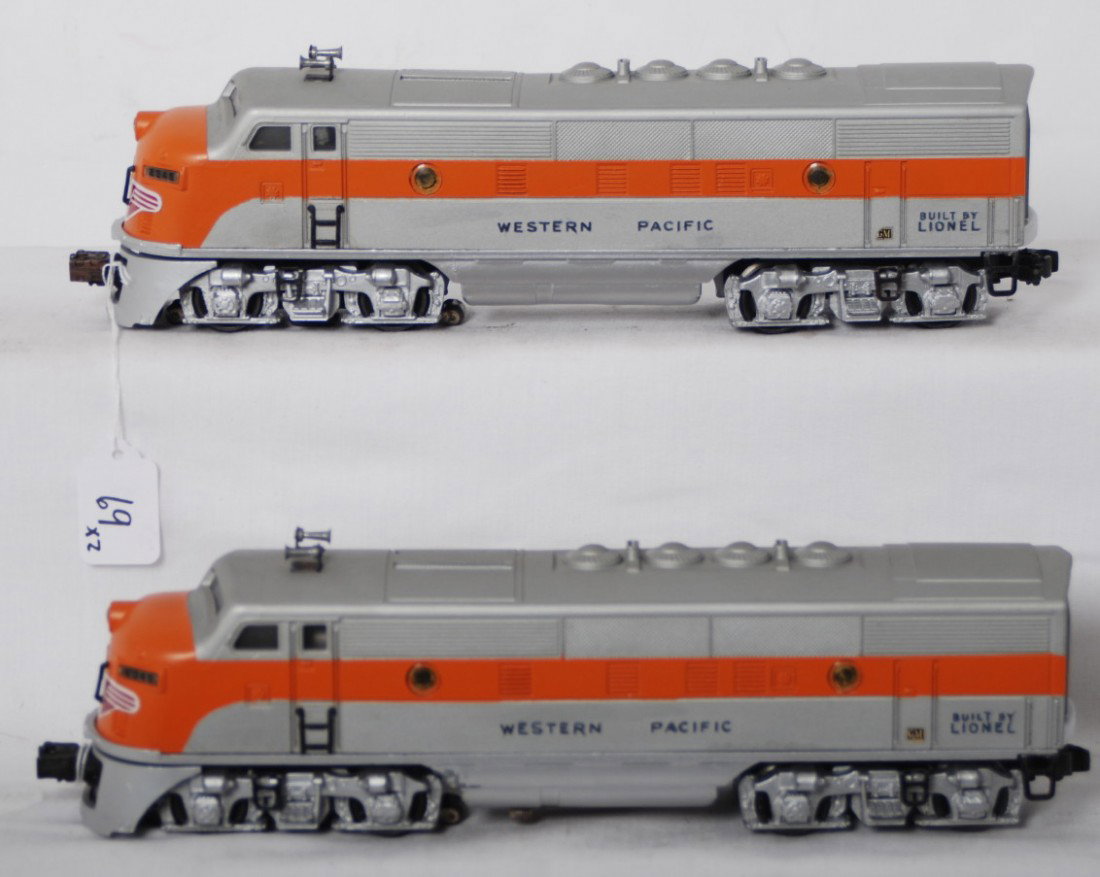 Restored Lionel 2345 Western Pacific F3a units: Postwar Lionel O gauge 2345 Western Pacific F3a diesel locomotives, restored to look C6+.