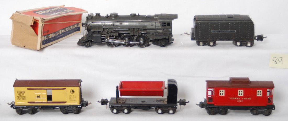 Lionel 225E, 2225W, 3659X in OB, 2655, 2657: Prewar Lionel O gauge 225E steam locomotive, 2225W whistle tender, 3659X automatic dump car, 2655 boxcar, and 2657 caboose. 3659 has journals painted silver, 2655 is missing a brake wheel, trains shou