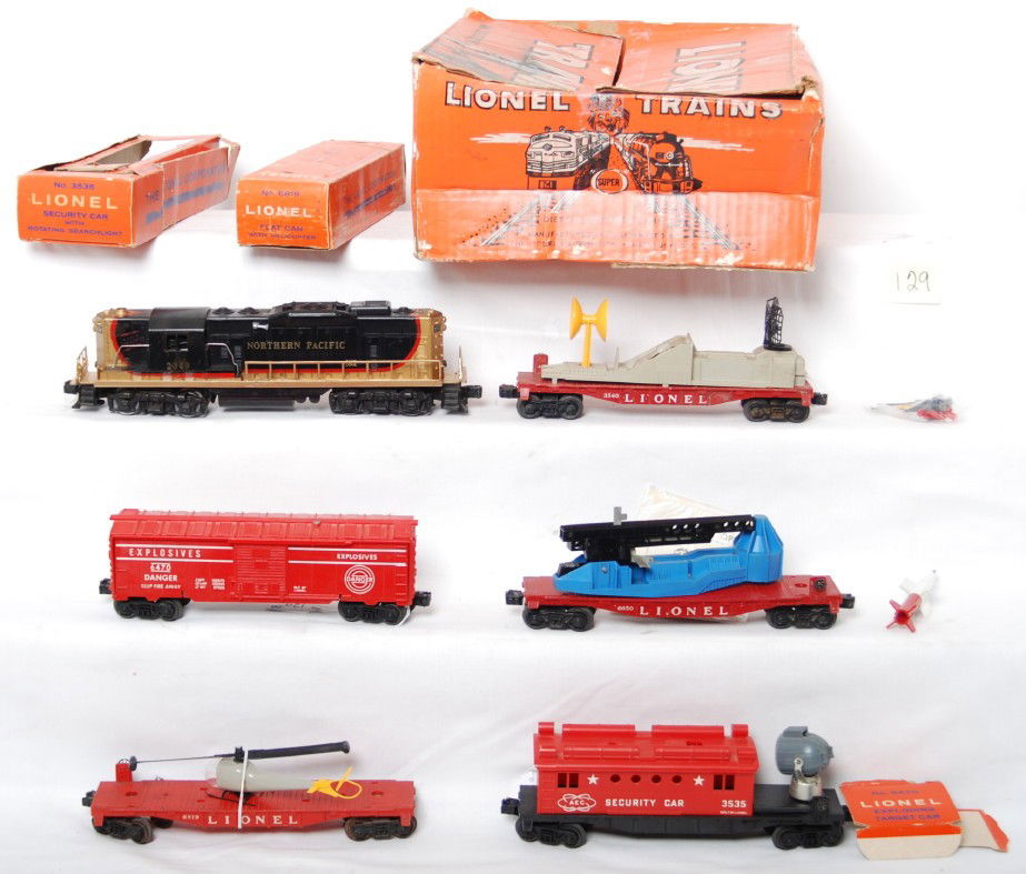 Lionel 2549W diesel loco w/horn set in OB: Postwar Lionel O gauge Super O diesel freight set 2549 with 2349 Northern Pacific GP diesel loco, 6470 explosives boxcar, 3540 radar car, 6650 missile launcher, 6819 flatcar with helicopter, and 3535