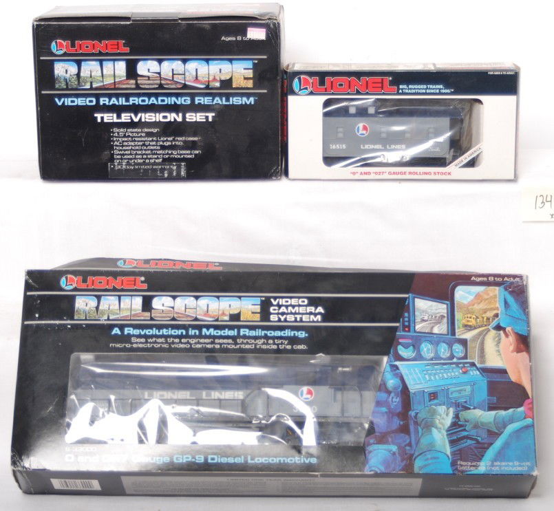 Lionel Railscope GP9, caboose and TV: Lionel modern O Gauge Railscope GP9 and Television set in OBs. Loco is C9-10 with very little signs of ever being run. Catalog number is 33000. Also is included is the 33002 television set. 16515 Rail