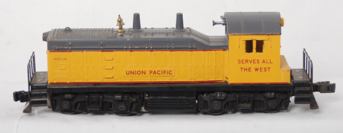 Lionel 613 Union Pacific NW-2 diesel switcher: Postwar Lionel O gauge 613 Union Pacific NW-2 diesel switcher locomotive, crack in nose from screw up, otherwise C6.