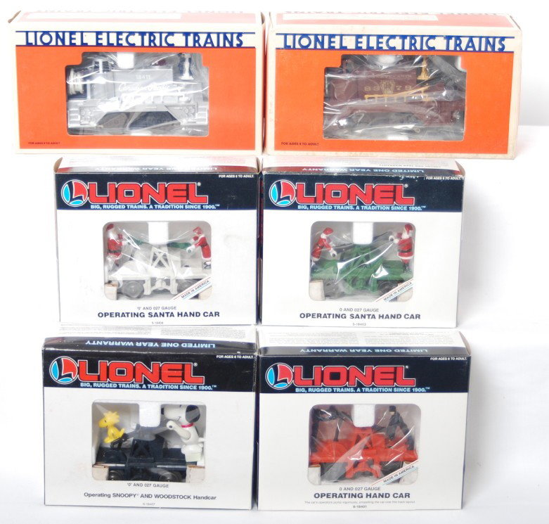 6 Lionel motorized units 18411, 18403, 18407, etc: Lionel modern O gauge motorized units in OBs. Six units include 18408 Santa hand car, 18403 Santa hand car, 18407 snoopy hand car, 18401 hand car, 18411 Canadian Pacific fire car, and 8379 Pennsylvani
