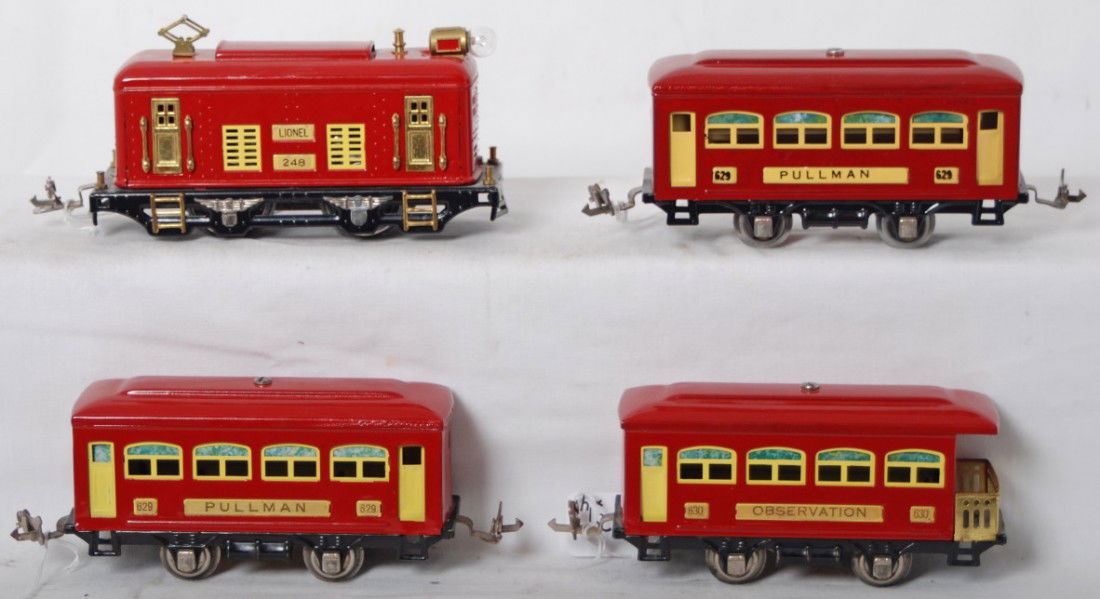 Lionel 248, 629, 629, 630 restored passenger trai: Prewar Lionel O gauge 248 electric locomotive, two 629 Pullman coaches, and a 630 observation restored in red paint scheme to look C7, loco has been rewheeled.