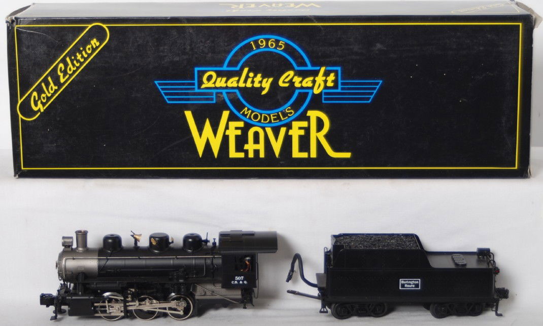 Weaver Burlington 0-6-0 switcher: Williams modern O gauge Burlington Route 0-6-0 USRA steam switcher in OB. Features brass body, constant lighting, smoke, and more. Loco is C8 condition with run time. OB has two rips near corners and