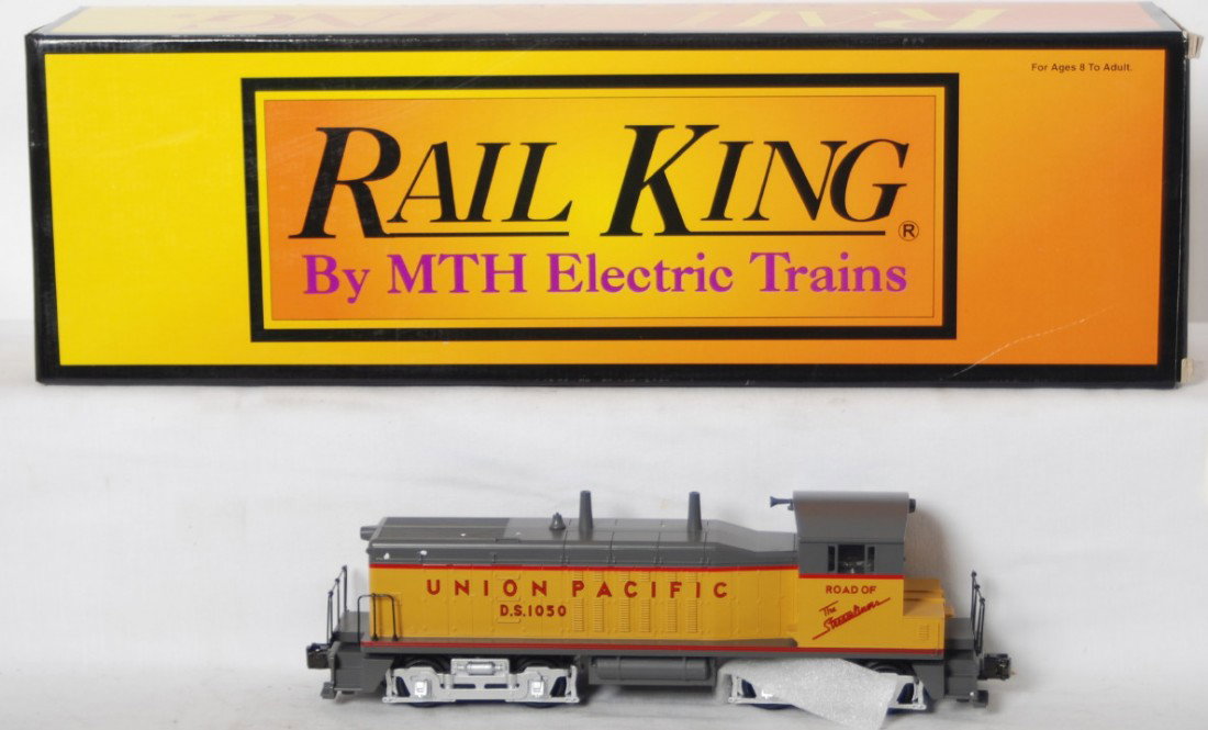 Railking Union Pacific NW-2 switcher with proto: MTH Railking modern O gauge 30-2138-1 Union Pacific NW-2 diesel locomotive in OB. Loco features Protosound, Protocouplers, and much more. Loco is C8-9 condition with light run time