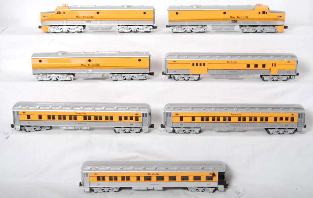 Williams Rio Grande Alco PA A-B-A and passenger ca: Williams modern O gauge Rio Grande passenger set. Includes Alco PA A-B-A locos two dummy and one powered. Also included are four heavy weight passenger cars. One broken knuckle on the rear of the obse