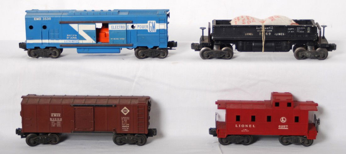 Lionel 3469, 3530, X6454, 6257 freight cars: Postwar Lionel O gauge 3469 automatic dump car w/207 bag of artificial coal, 3530 GM EMD generator car full stripe variation, X6454 Erie boxcar, and 6257 caboose, C6.
