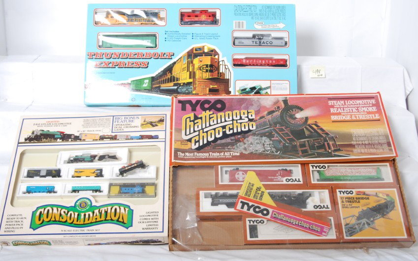 3 HO and N scale starter sets: Modern HO and N scale starter sets. Three sets include N scale Bachmann 50-4410 Consolidation set missing track and transformer, Tyco Chattanooga Choo Choo set missing track and transformer, and Mehan