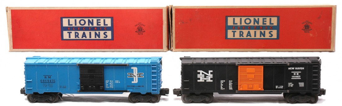 Lionel 6464-425 New Haven 6464-475 B&M MIB: Lionel postwar 6464 boxcars including; 6464-425 black New Haven type IIb and a 6464-475 Boston and Maine type IIb both in OBs. Cars have never been run, C9. The OBs have most all flaps attached with s