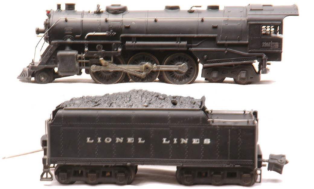 Lionel 226 Black Steam Loco 2226WX Tender: Lionel prewar O gauge 226 black 2-6-4 steam loco and a 2226WX tender. Except for a couple of small nicks on the loco, the loco is C8. The tender shell has warped and the coupler has broken off but is 
